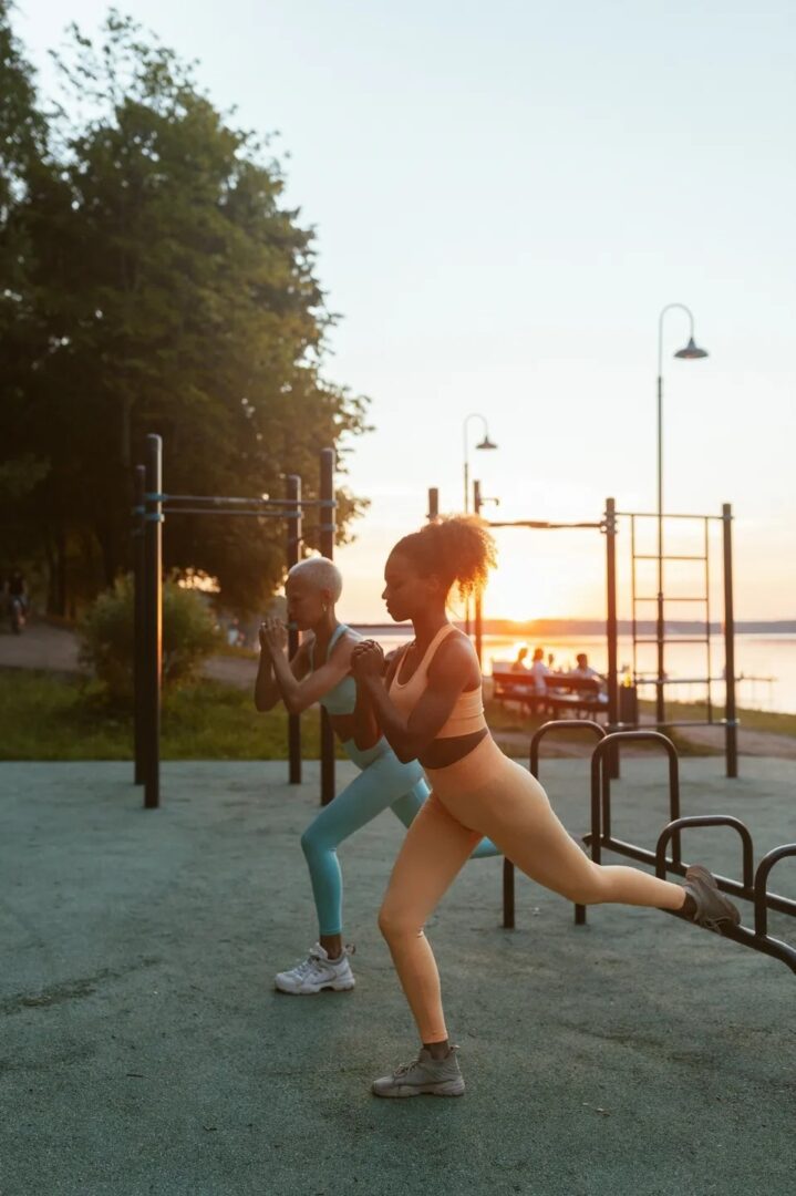 Couple of women's stretching their legs in the park